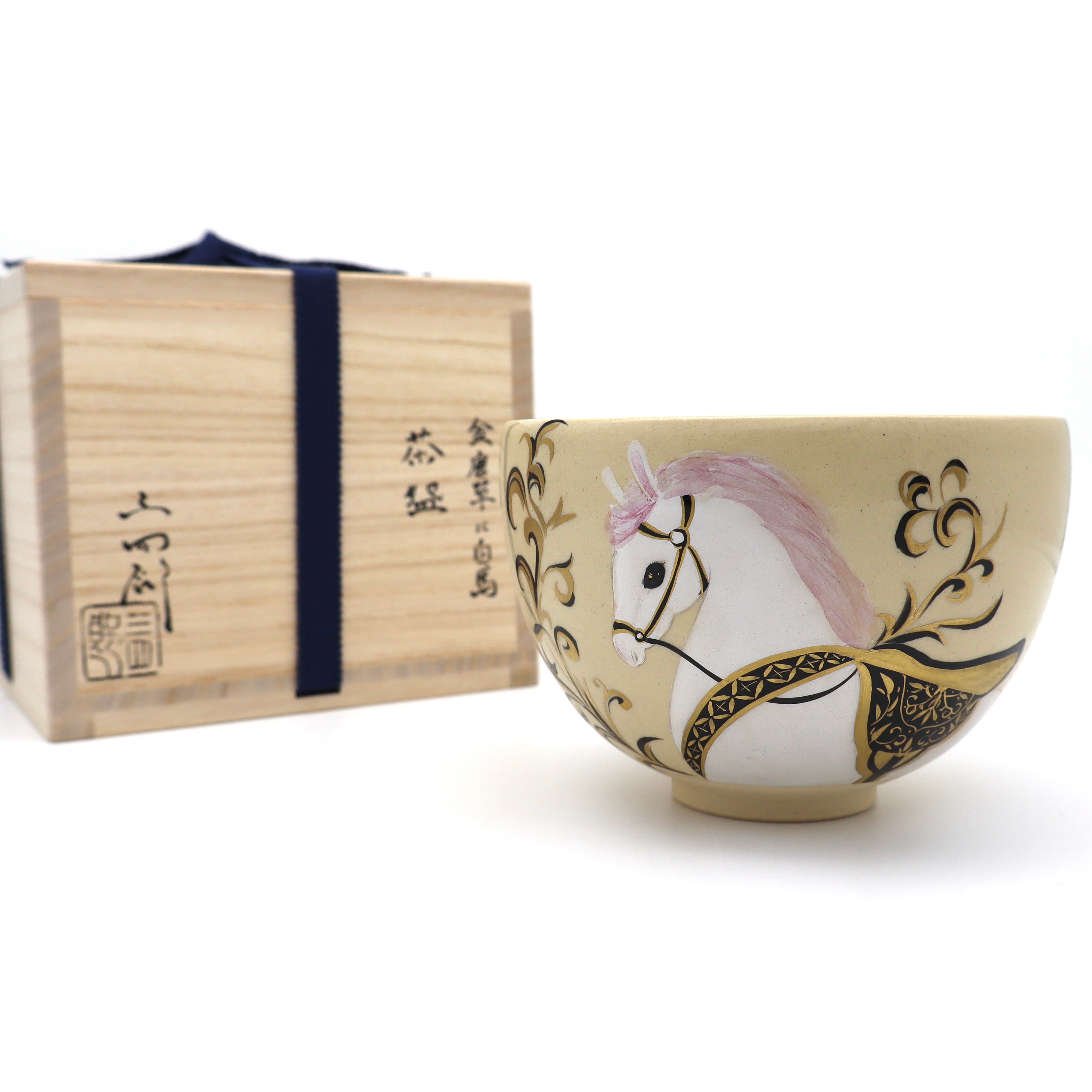 Hakuba chawan tea bowl with signed kiribako wooden box, horse with golden eye and pink hair, angled shot