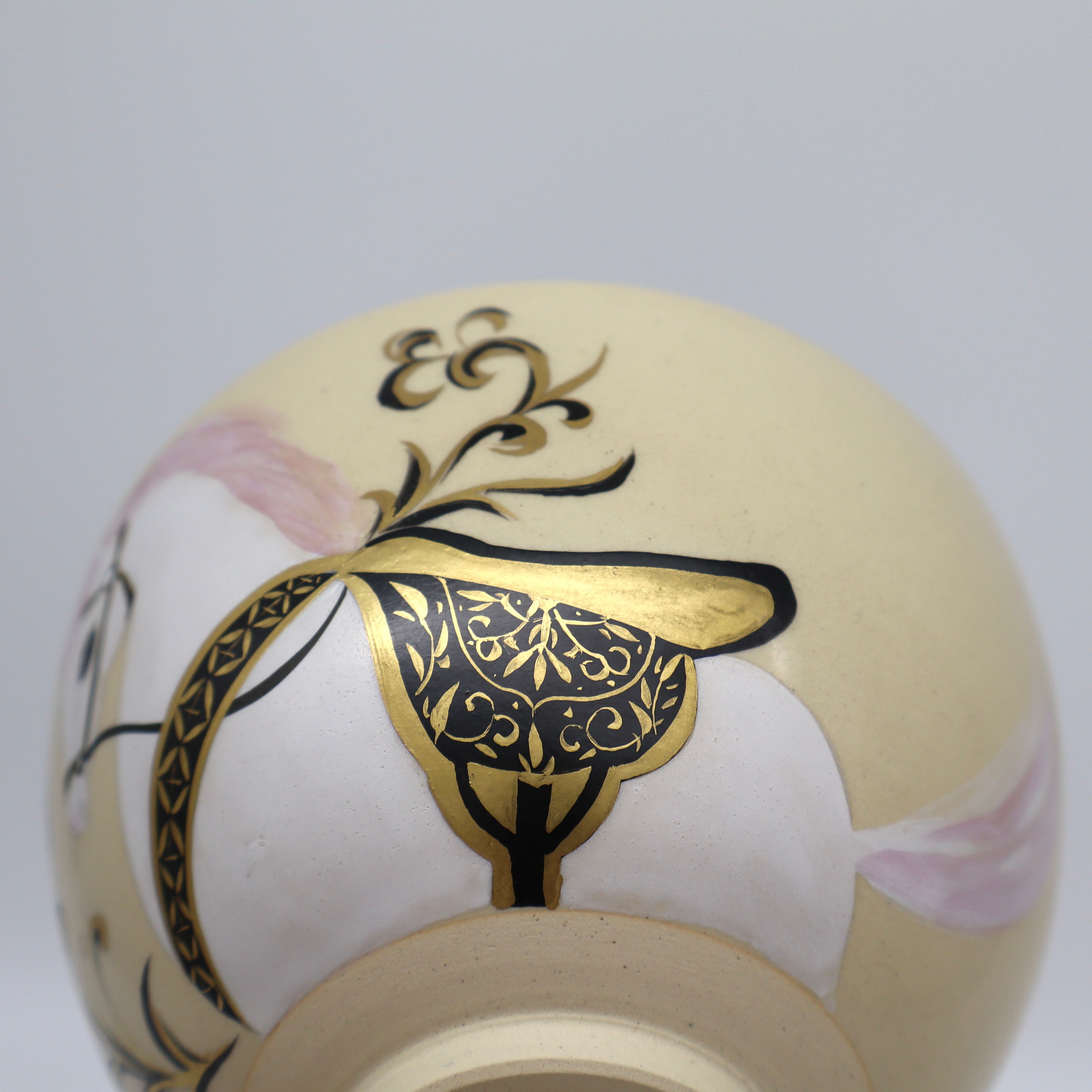 Gold karakusa arabesque pattern detail on Japanese tea ceremony bowl